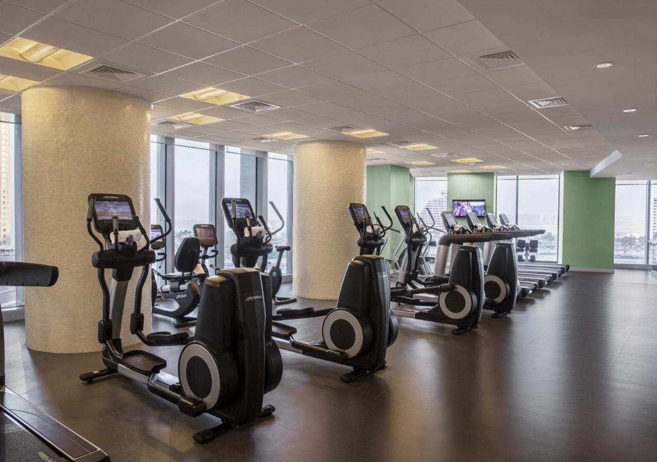 City Centre Rotana Dauhá Exteriér fotografie Elliptical cross trainers